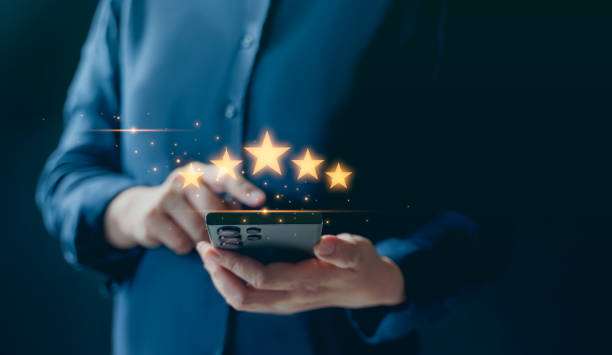 istock customer services best excellent business rating experience. Satisfaction survey concept. Hand of a businessman chooses a smile face on mobile feedback. 5 Star Satisfaction. 1840186404