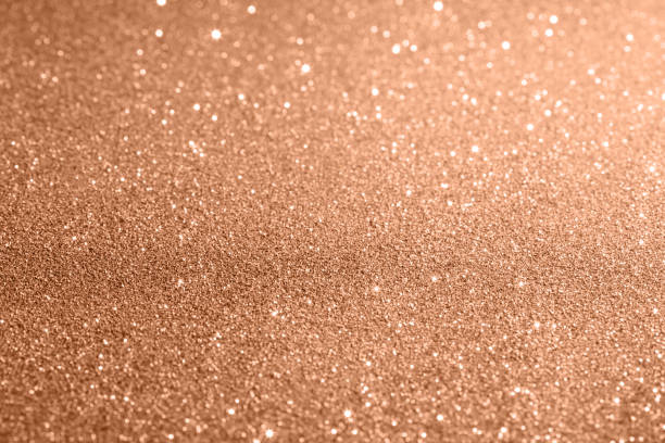 istock Peach colour glittering background for design and free space. 1840200116
