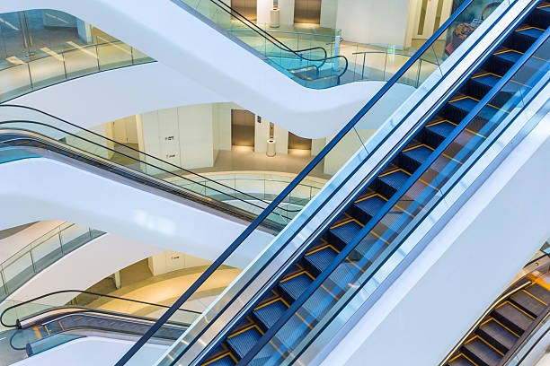 istock Stairs and Escalators in Modern Office Building 184024329