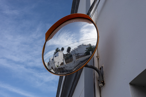 Houses of Haria in the north of canary island Lanzarote reflected in a mirror