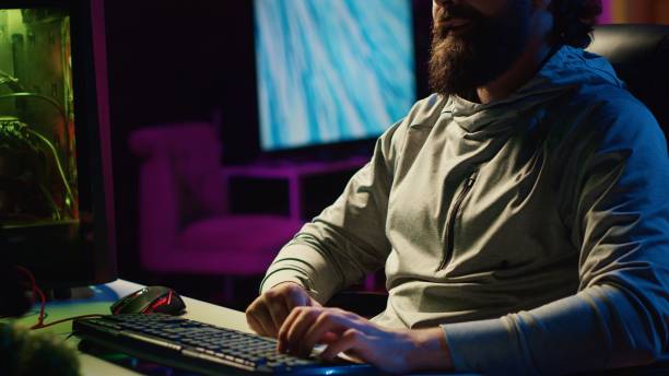 istock Streamer in studio talking with viewers, presenting his strategy for upcoming esports competition 1840253854