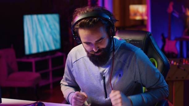 istock Professional player competing in videogame tournaments online 1840262843