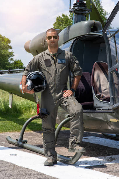 istock A young military pilot poses next to his aircraft. 1840279356