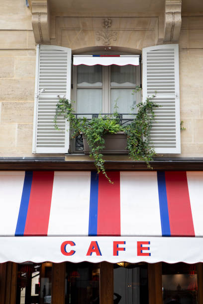 istock Shuttered window and window box above a cafe 1840294211