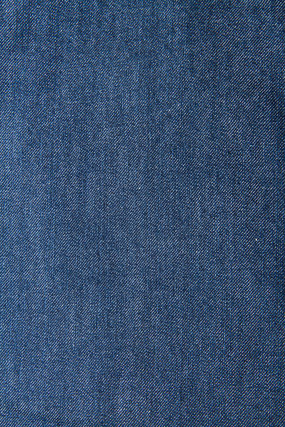 istock close-up shot of deep blue denim jeans. 184031719