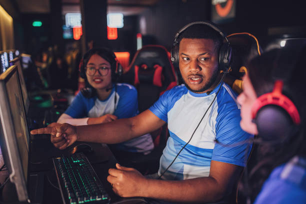 istock Professional eSports Team Discussing Strategy With Teammates 1840352093