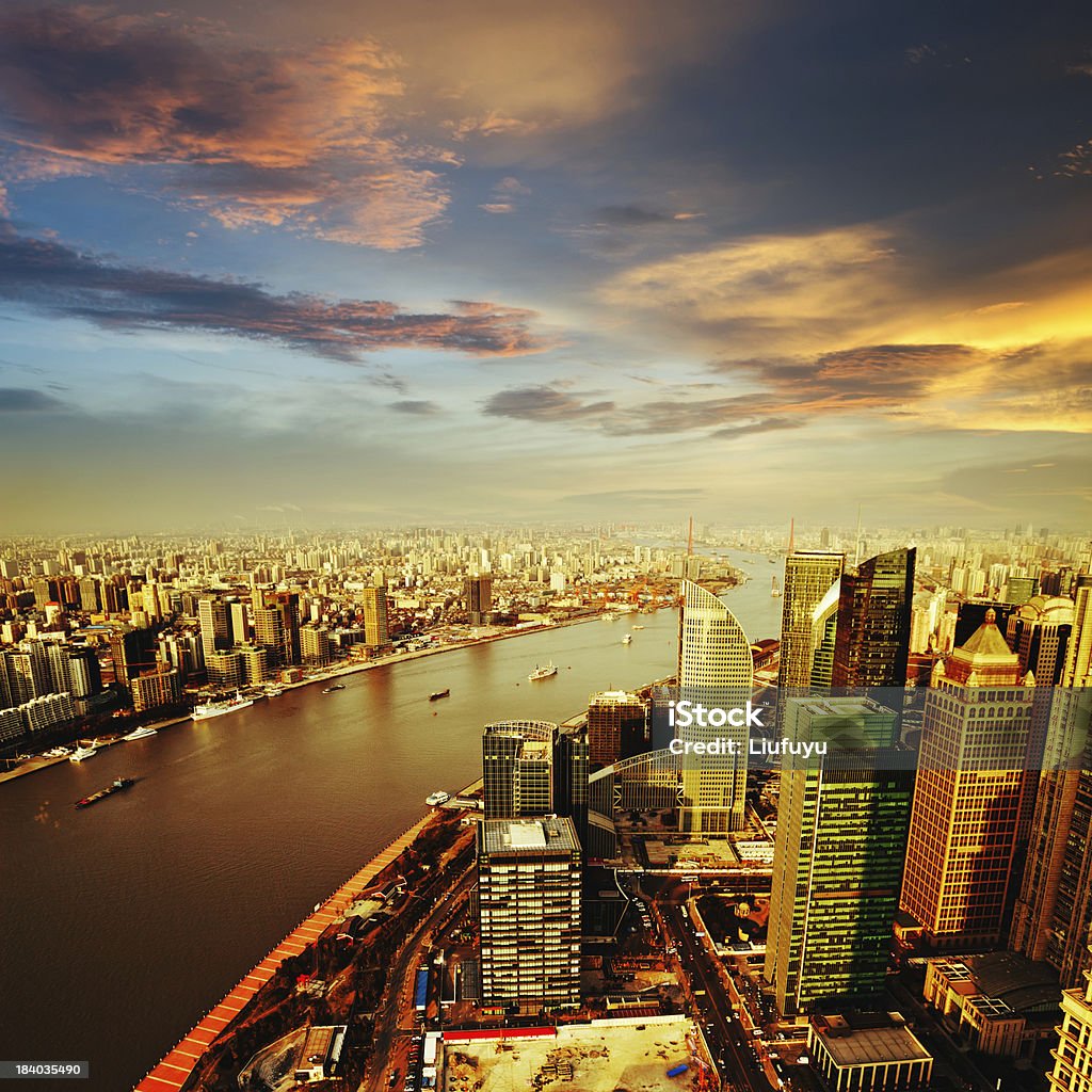 shanghai pudong skyline at sunset Pudong skyline at sunset, Shanghai, China Huangpu River Stock Photo