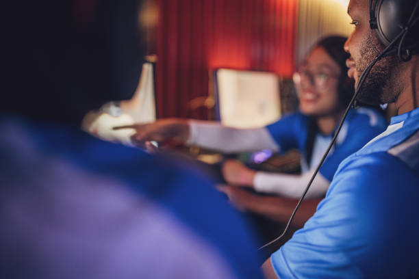 istock Professional eSports Team Discussing Strategy With Teammates 1840355051
