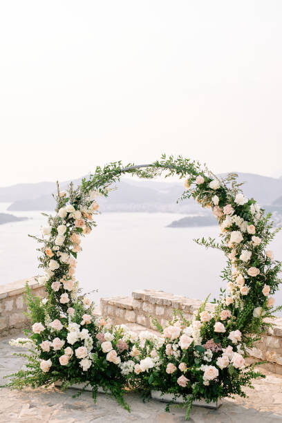 istock Round wedding arch stands on an observation deck on a mountain above the sea 1840357726