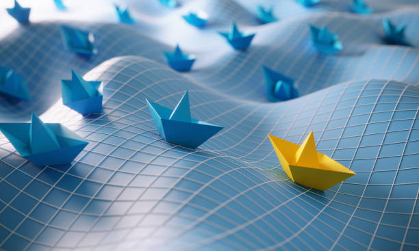 leadership concept with paper boats - liderança imagens e fotografias de stock
