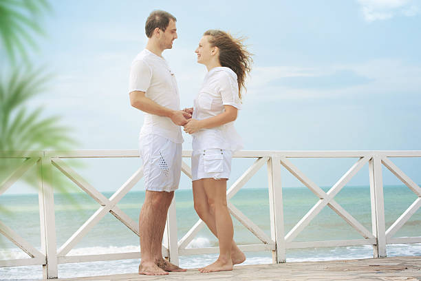istock Young couple at the beach 184037989
