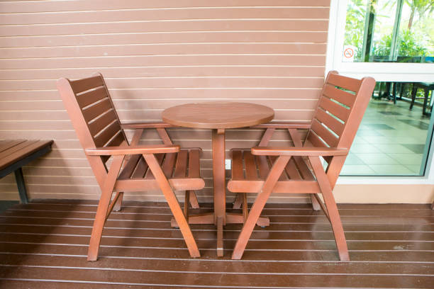 leisure corner with wood chairs and table on wooden floor in coffee shop