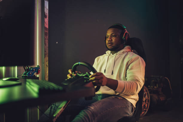 Young Back Man Playing Racing Video Games