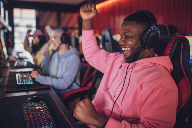 istock Happy Black Man Gamer Celebrating His Victory 1840428561
