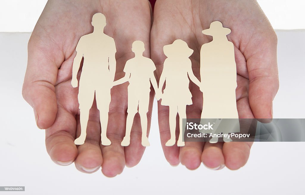 Masculino mão segurando a família forma de Recorte - Royalty-free Adulto Foto de stock