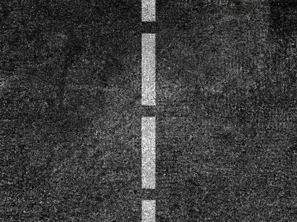istock Asphalt road with dividing white line 1840450645