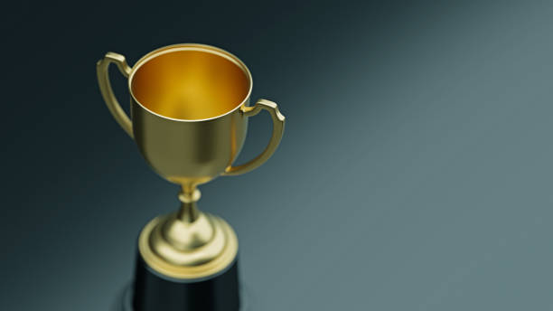 istock Gold Trophy Sitting on Black Background 1840461373