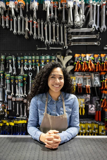 istock Happy saleswoman working at a hardware store 1840466277