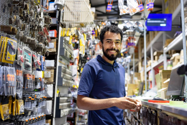 istock Happy employee working at a hardware store 1840466801