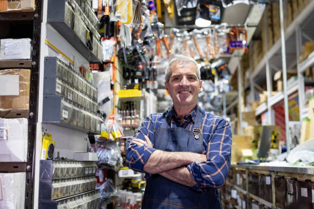 Happy business owner working at a hardware store