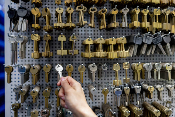 Close-up on a person shopping for a key at a hardware store - security concepts