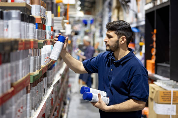 istock Employee working at a hardware store restocking the shelves 1840468485