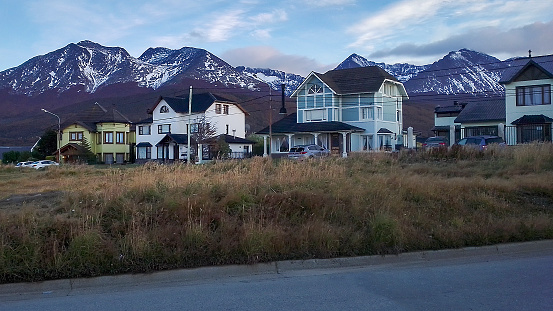 Empty road at ushuaia outskirt neighborhood, tierra del fuego province, argentina