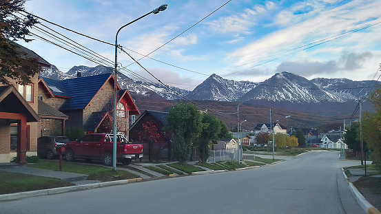 Empty road at ushuaia outskirt neighborhood, tierra del fuego province, argentina