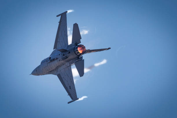 Viper Vapor Miramar, California, USA - September 23, 2023: A flash of vapor breaks around an F-16 Falcon of the US Air Force Viper Demonstration Team at America's Airshow 2023. miramar air show stock pictures, royalty-free photos & images