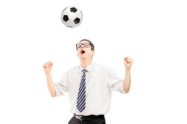 istock Young handsome man playing with a soccer ball 184047990