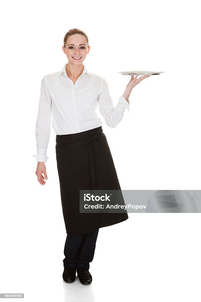 Single Waitress A Single Waitress Posing While Holding A Tray Stock Photo - Download ...