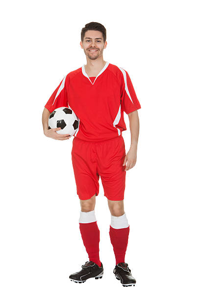 istock Young Soccer Player Holding Ball 184049113