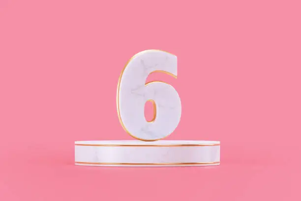 Number 6 over marble textured white podium on pink background. Horizontal composition with copy space. Front view.