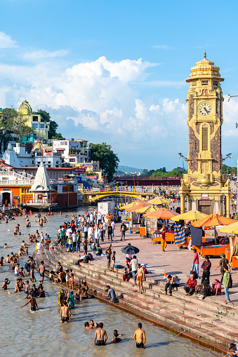 haridwar, india. 15th september, 2023: people are doing purification ceremony in ganges river at haridwar