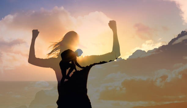 istock Young men and women reaching their goals. 1840517414