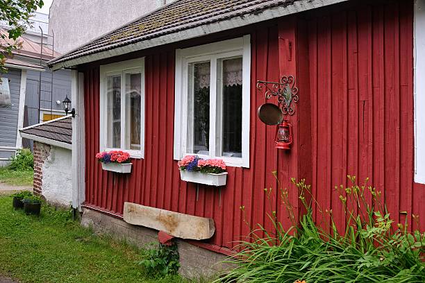 Old red wooden 1700th century smithy buildings in Eskilstuna, Sweden.