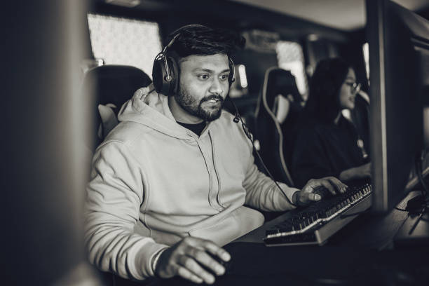 istock Young Indian Man Playing Video Games On PC 1840526380