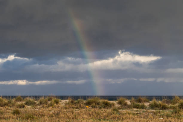 istock Rainbow in the middle of the sea 1840526669
