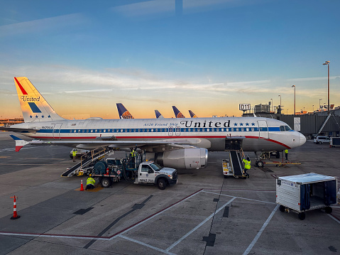 12/13/22 - Dulles airport, Washington DC, USA - A United Airlines Airbus 321 with a retro livery Continental Airlines paint job at the terminal at Washington DC's Dulles International airport