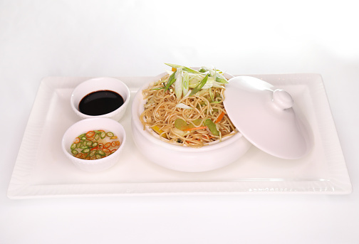 VEGETABLE HAKKA NOODLE with bell pepper and spring onion and sauce served in dish isolated on background side view of arab food