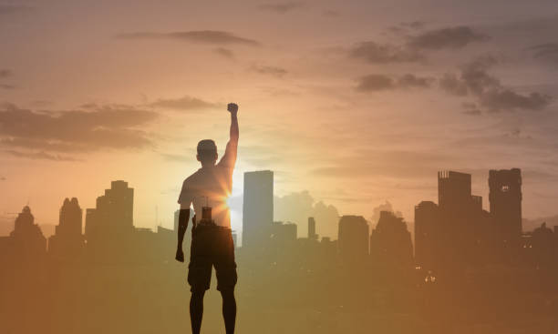 istock Young man in the city reaching his goals. 1840553389