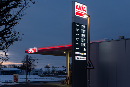 Freystadt, Germany - December 5, 2023: Petrol station in the evening of a winter day. AVIA with headquarter in Zurich, Switzerland has over 3100 service stations in Europe.