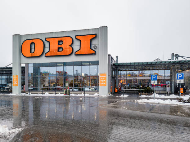 Neumarkt, Germany - December 6, 2023: Building of the hardware store OBI in the town Neumarkt, Bavaria, Germany. Winter day with snow in front of the building.