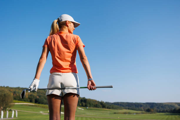 istock Vibrant Young Lady Playing Golf 1840588479