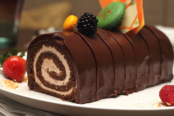istock chocolate log cake with strawberry 184058887