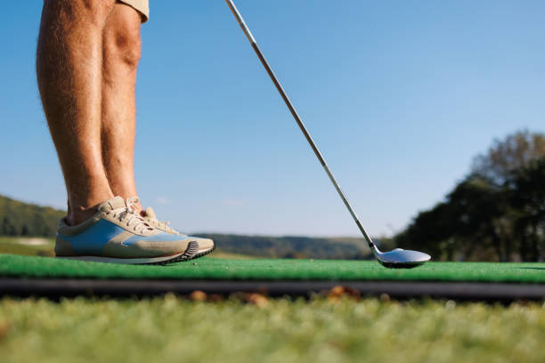 istock On the Green: Young Golfer's Inaugural Shot 1840589567