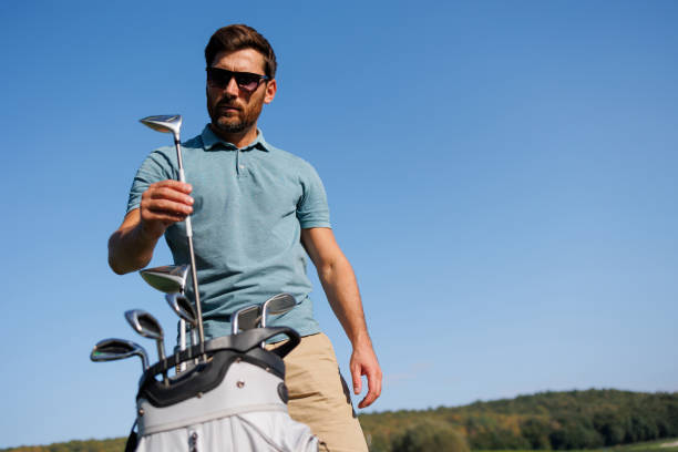 istock Golfer Unveils Club on Fairway 1840592851