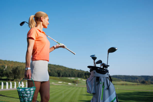 istock Golf Lifestyle: Active Young Lady with Club Bag 1840593387