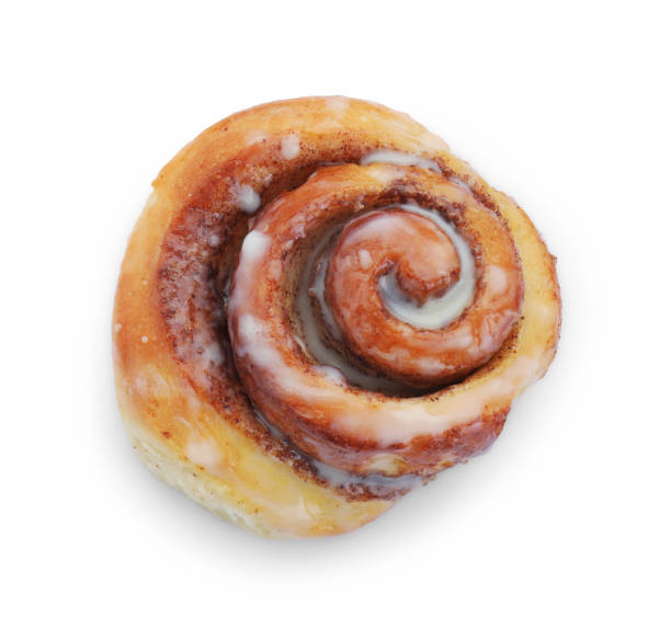 istock One tasty cinnamon roll isolated on white, top view 1840593484