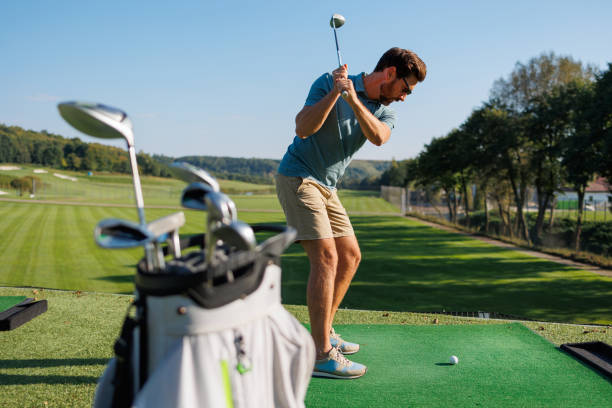 istock The Art of the Drive: Youthful Golfer in Motion 1840598163